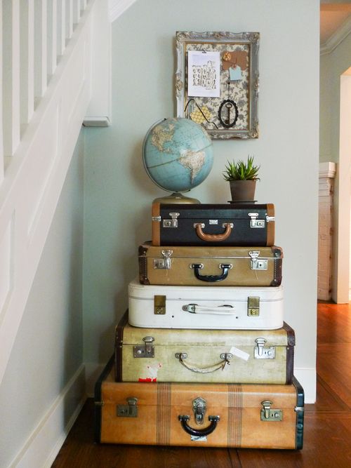 Love stacking suitcases and globes for entry way