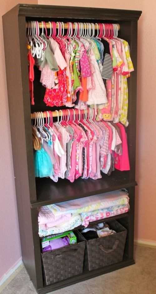 Great use of bookshelves for extra clothes