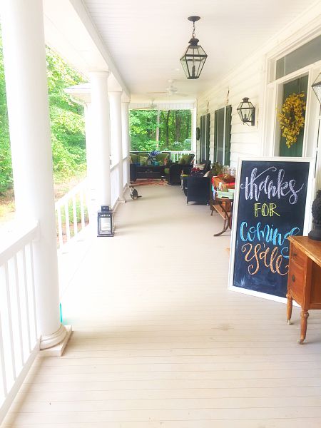 Use large homemade chalkboard on front porch